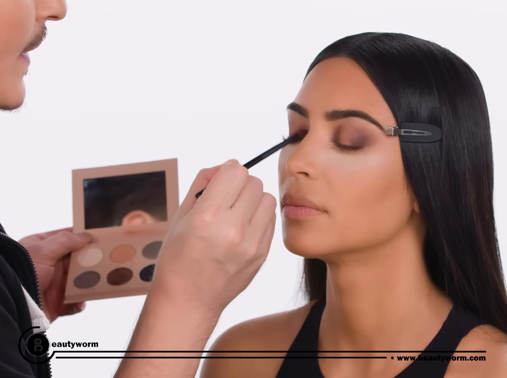 Blending is essential for creating a smooth, seamless smokey eye. Start by applying a light base color to the entire eyelid.